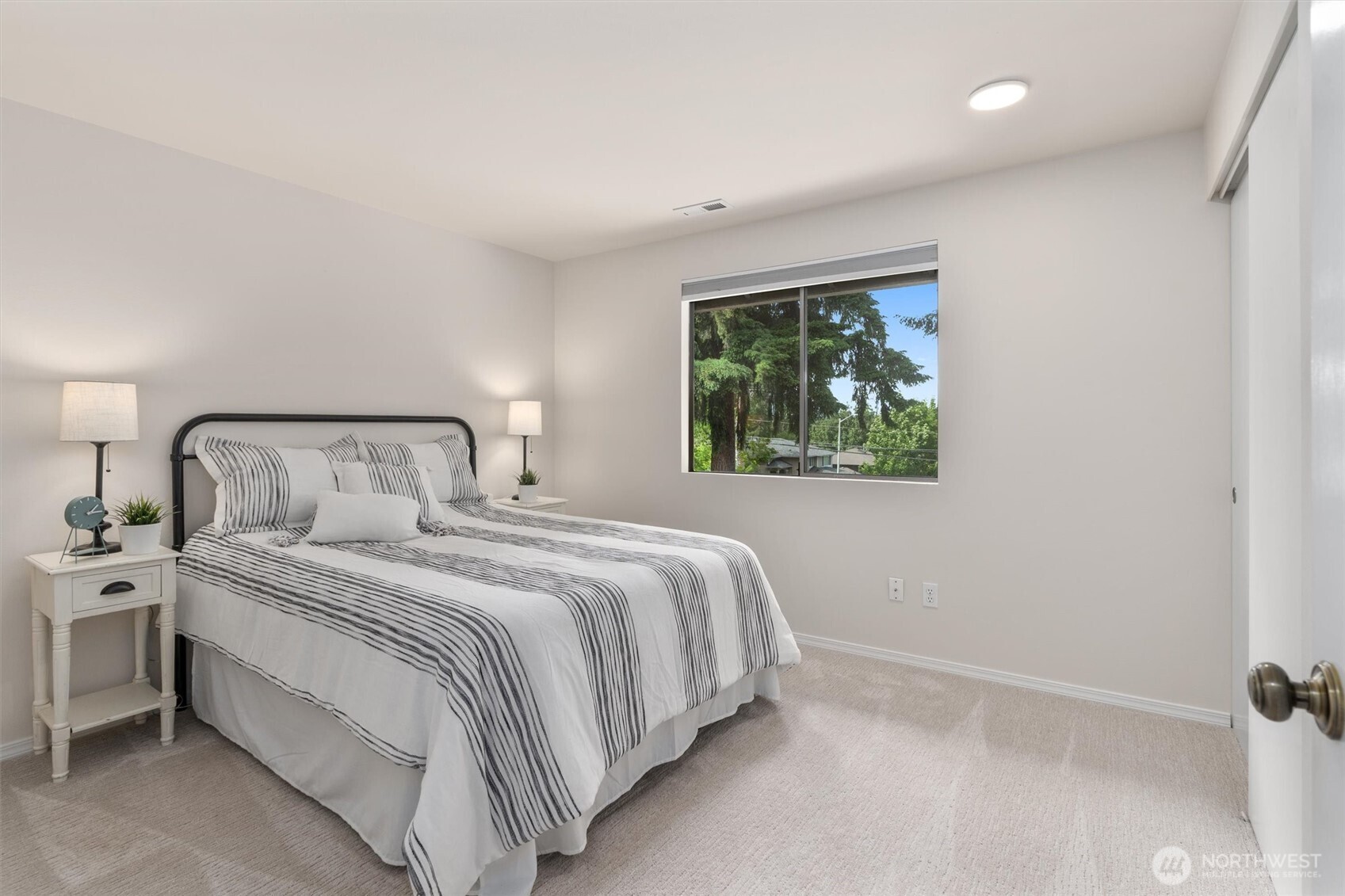 2101 233rd Street Southeast Bothell, WA 98021 - Photo 20 of 40 a bedroom with a bed and a window