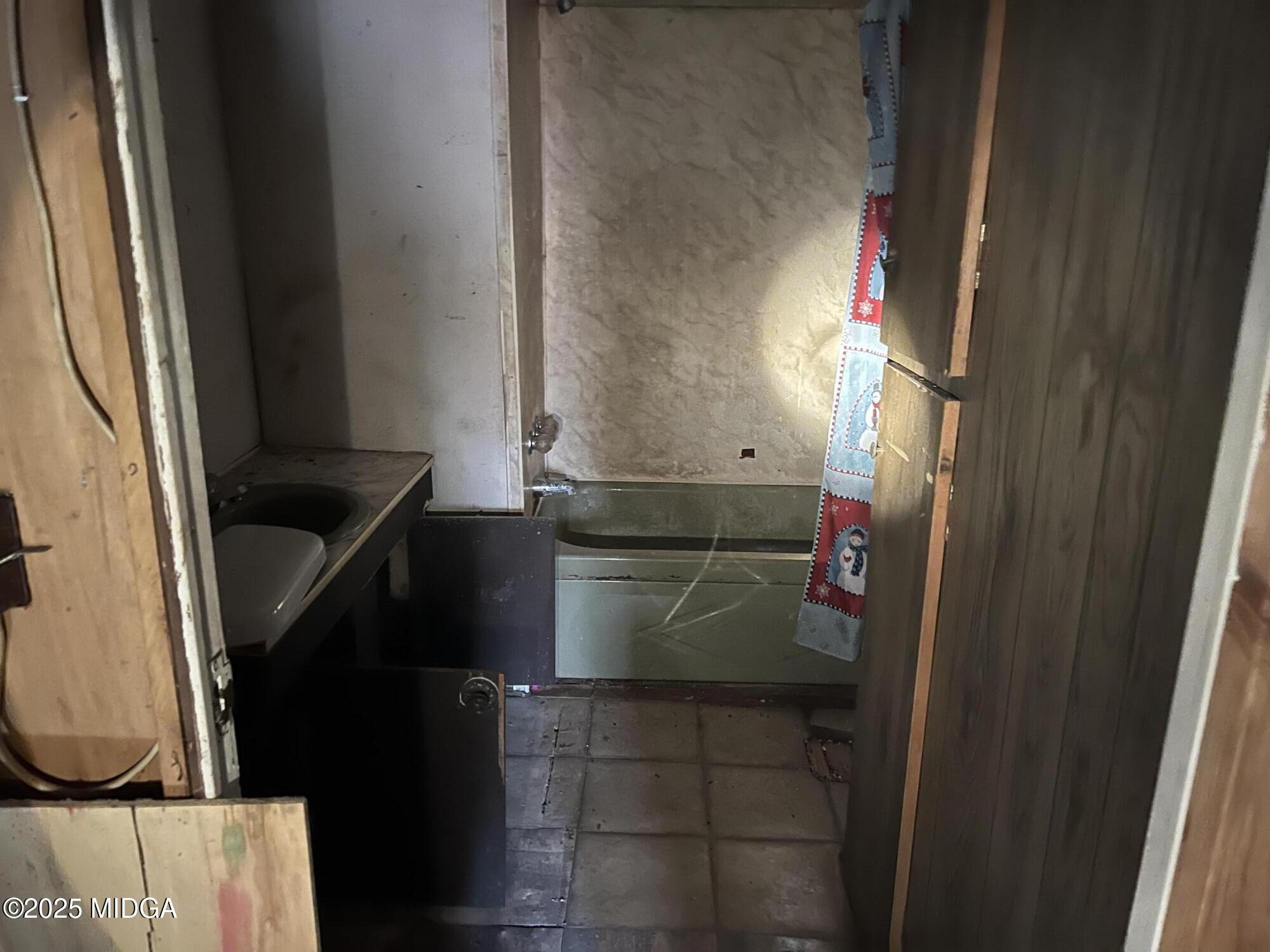 65 Little John Trail Hampton, GA 30228 - Photo 2 of 10 a close view of water heater room