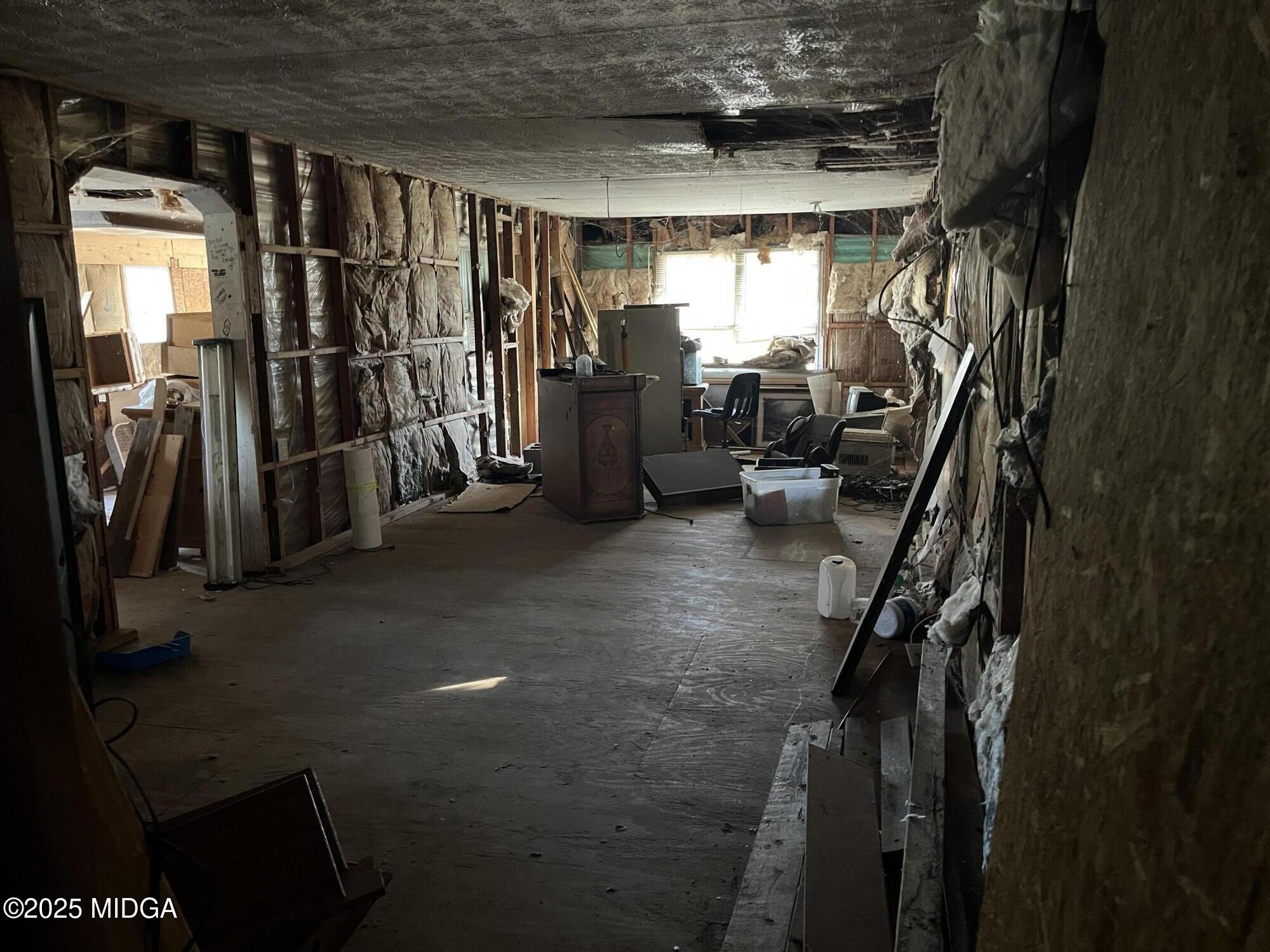 65 Little John Trail Hampton, GA 30228 - Photo 8 of 10 a view of a room with gym equipment