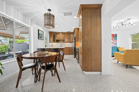 a view of a dining room with furniture