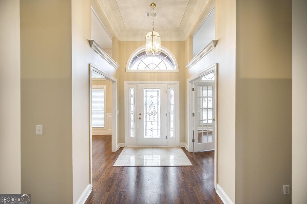 209 Trellis Walk Centerville, GA 31028 - Photo 6 of 38 a view of entryway with wooden floor