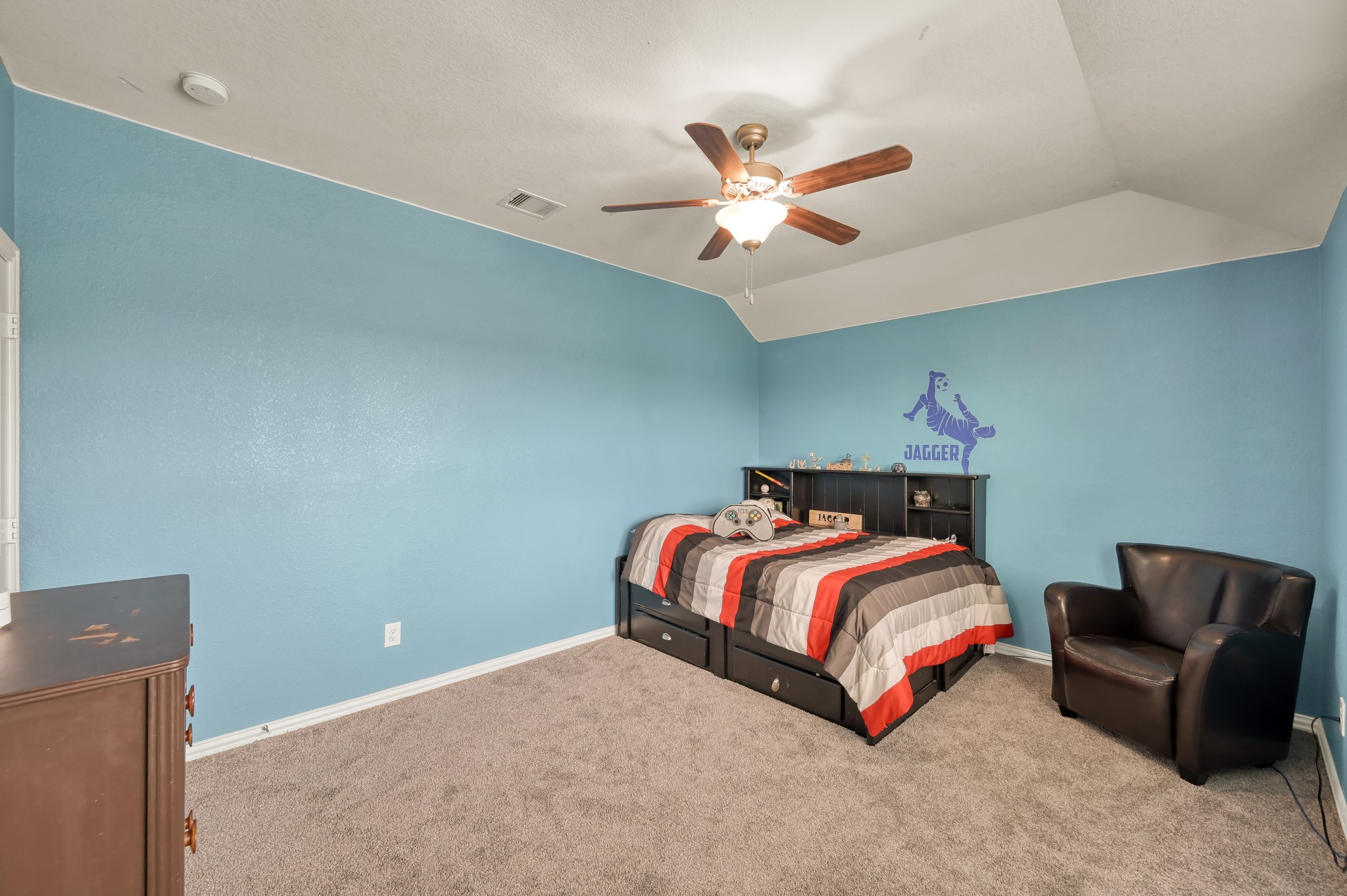 3562 Hamilton Bend Lane Spring, TX 77386 - Photo 13 of 17 A spacious secondary bedroom with high ceilings and plenty of room for furniture, play, or a setup that grows with your needs.