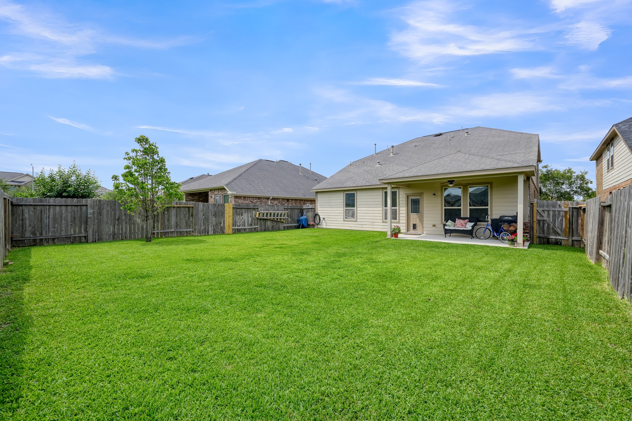 3562 Hamilton Bend Lane Spring, TX 77386 - Photo 16 of 17 The backyard gives you plenty of room to enjoy being outside, with a covered patio for relaxing in the shade and a spacious lawn for kids, pets, gardening, or weekend get-togethers.