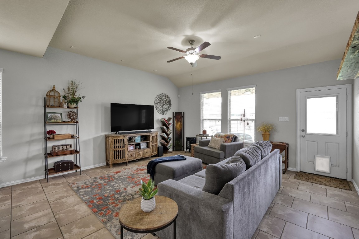 3562 Hamilton Bend Lane Spring, TX 77386 - Photo 8 of 17 The living room feels comfortable and easy, with tall ceilings, great natural light, and plenty of room to relax at the end of the day.