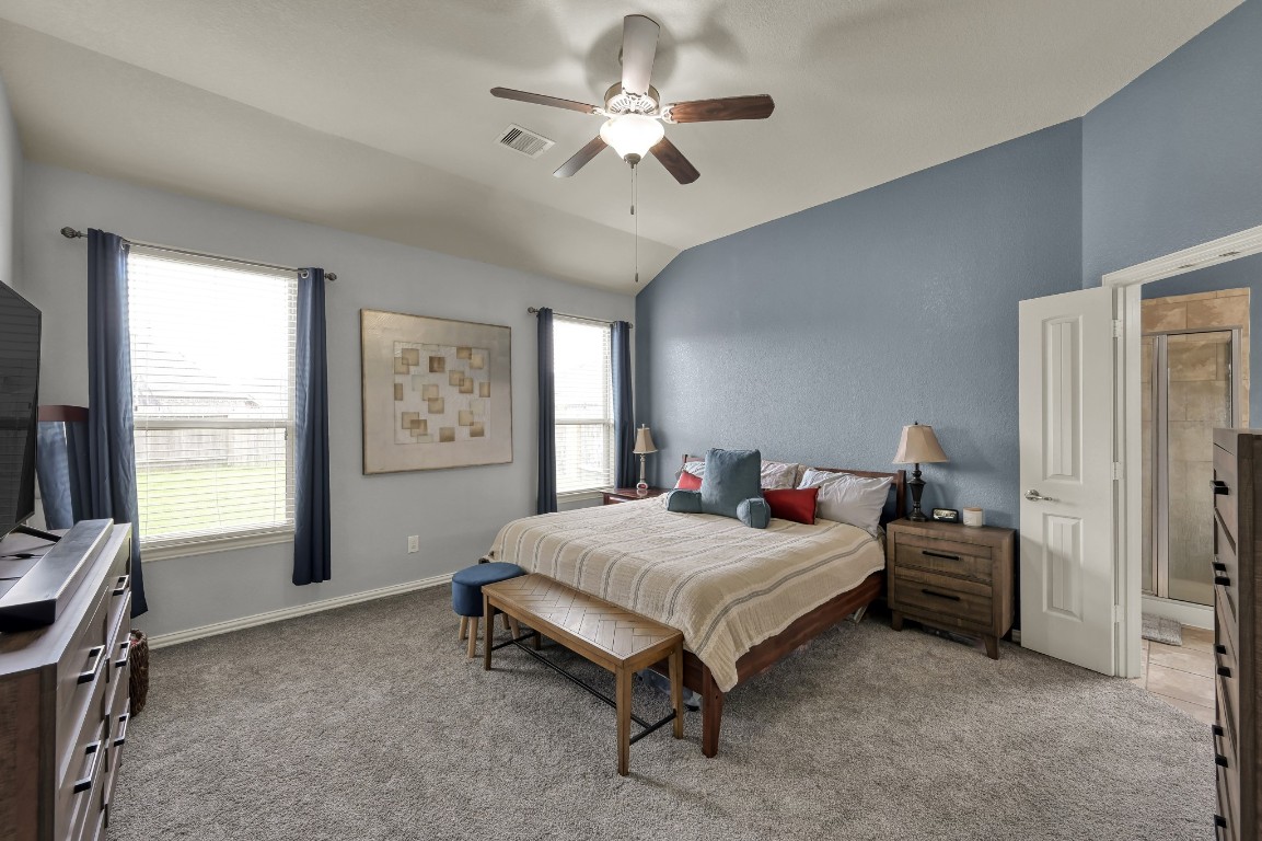 3562 Hamilton Bend Lane Spring, TX 77386 - Photo 10 of 17 The primary bedroom gives you a spacious place to unwind, with high ceilings and soft natural light.