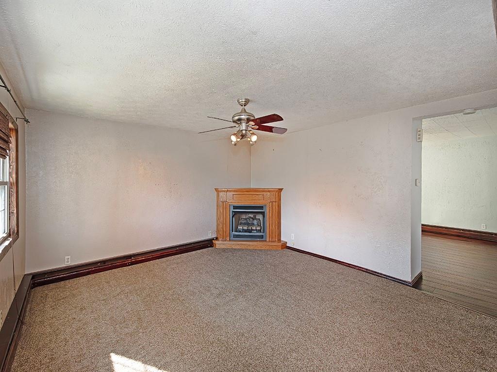223-227 Old Mill Road Apollo, PA 15613 - Photo 11 of 45 a view of an empty room with a ceiling fan