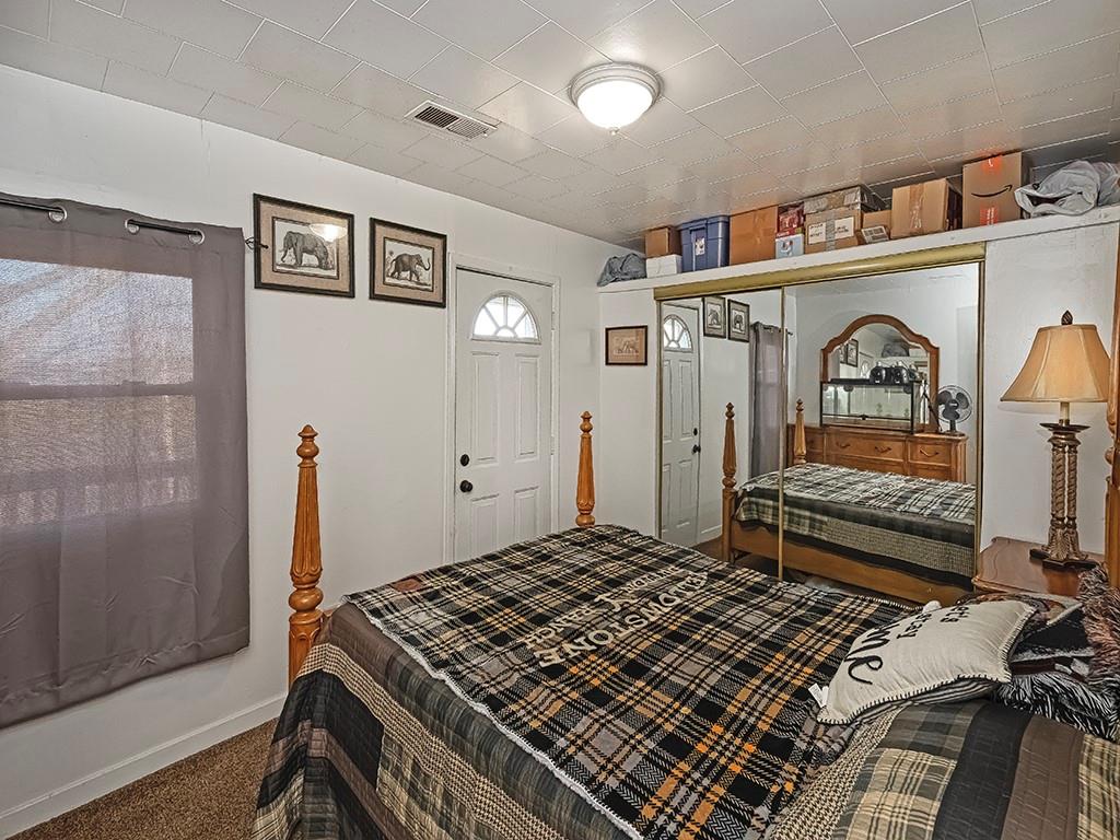 223-227 Old Mill Road Apollo, PA 15613 - Photo 26 of 45 a bedroom with furniture and a book shelf