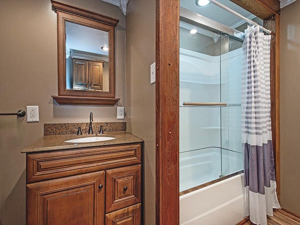 223-227 Old Mill Road Apollo, PA 15613 - Photo 28 of 45 a bathroom with a sink and a mirror