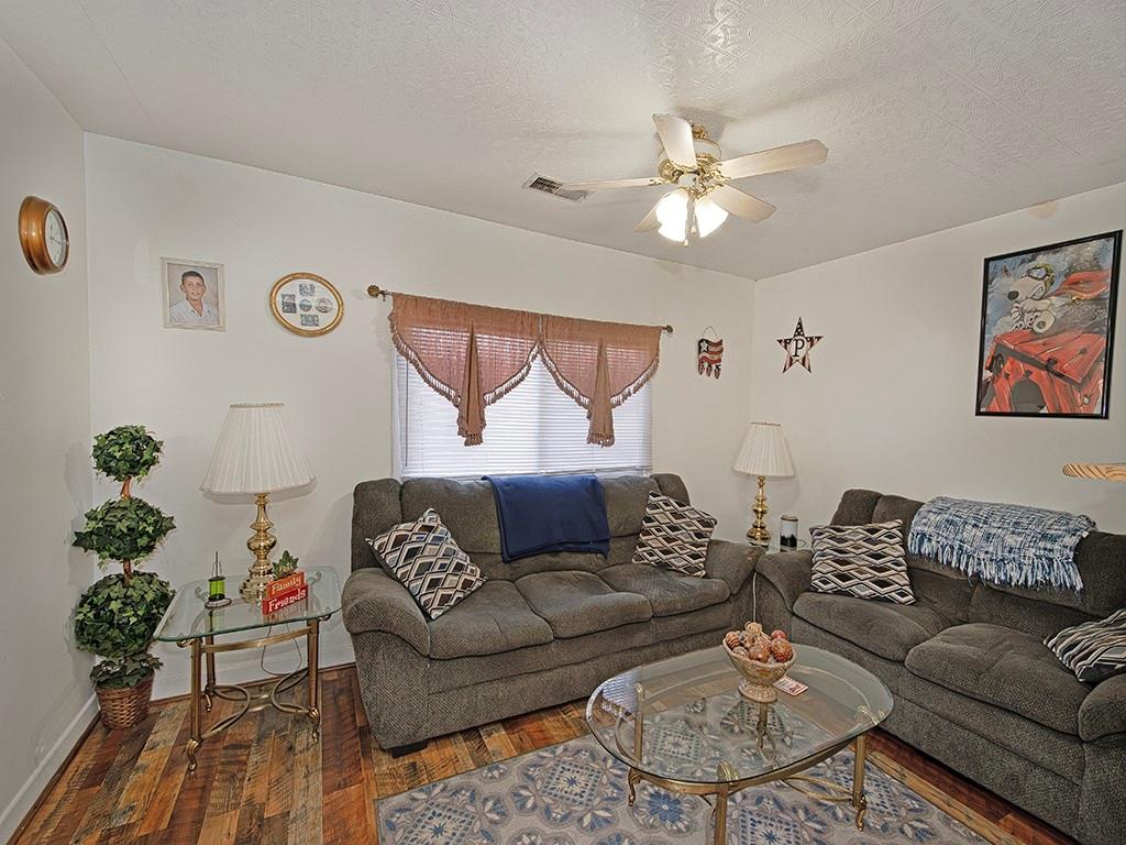 223-227 Old Mill Road Apollo, PA 15613 - Photo 33 of 45 a living room with furniture and a chandelier