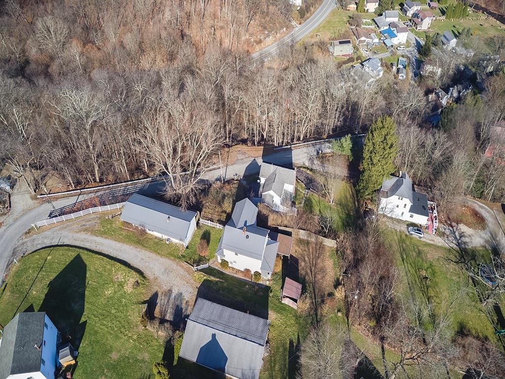 223-227 Old Mill Road Apollo, PA 15613 - Photo 42 of 45 an aerial view of a house with garden space and trees