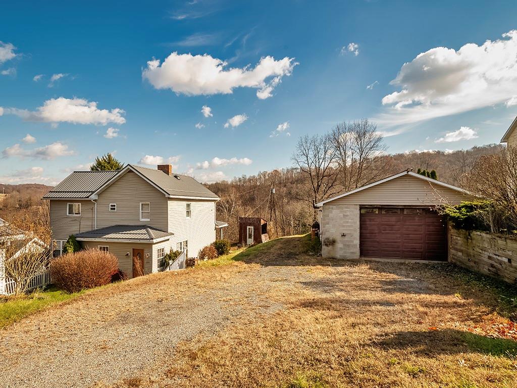 223-227 Old Mill Road Apollo, PA 15613 - Photo 6 of 45 a view of a house with a yard