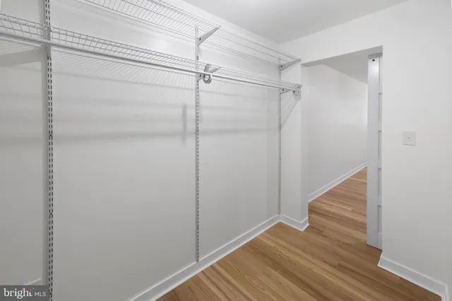 a view of an empty walk in closet