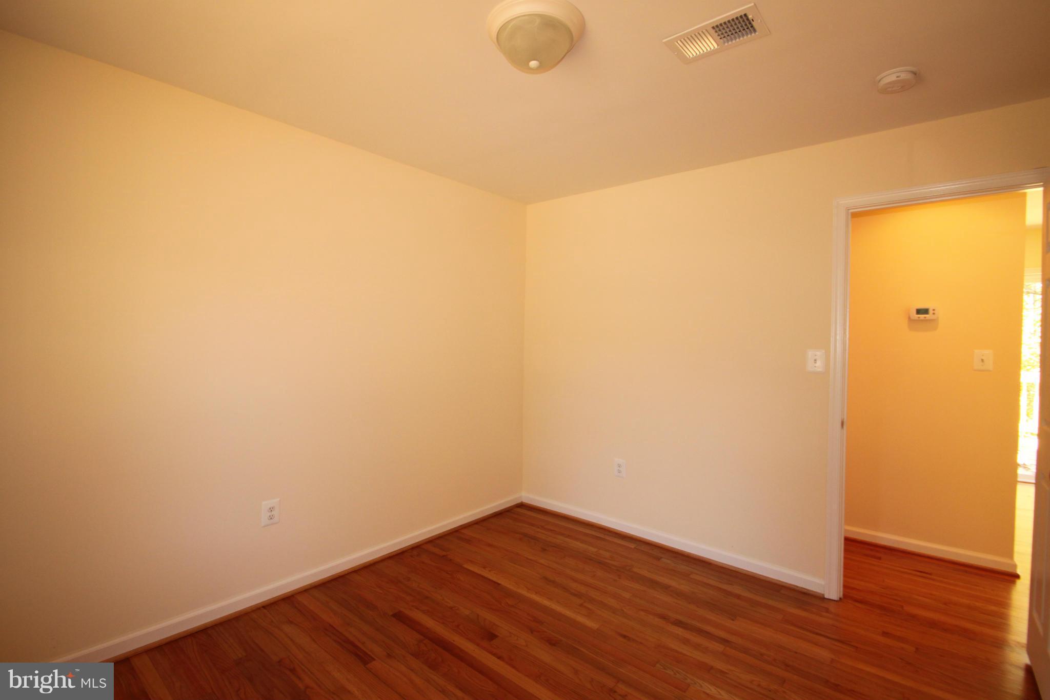 14394 Shanktown Road Reva, VA 22735 - Photo 11 of 18 a view of a room with wooden floor