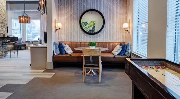 a living room with furniture and a table