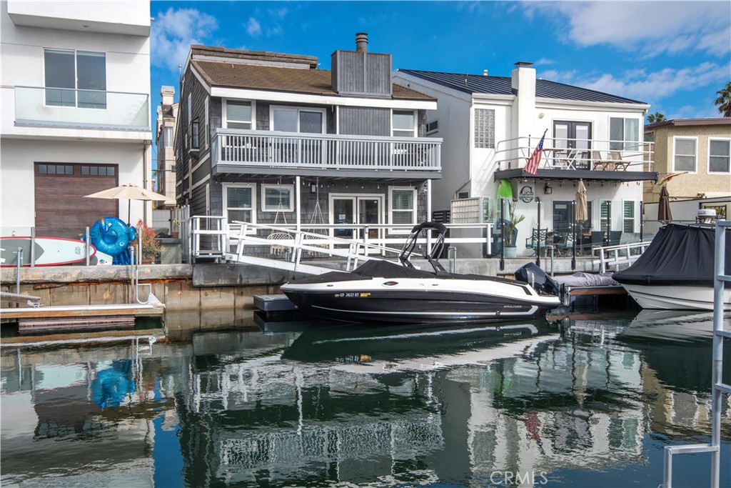 a front view of a building with swimming pool