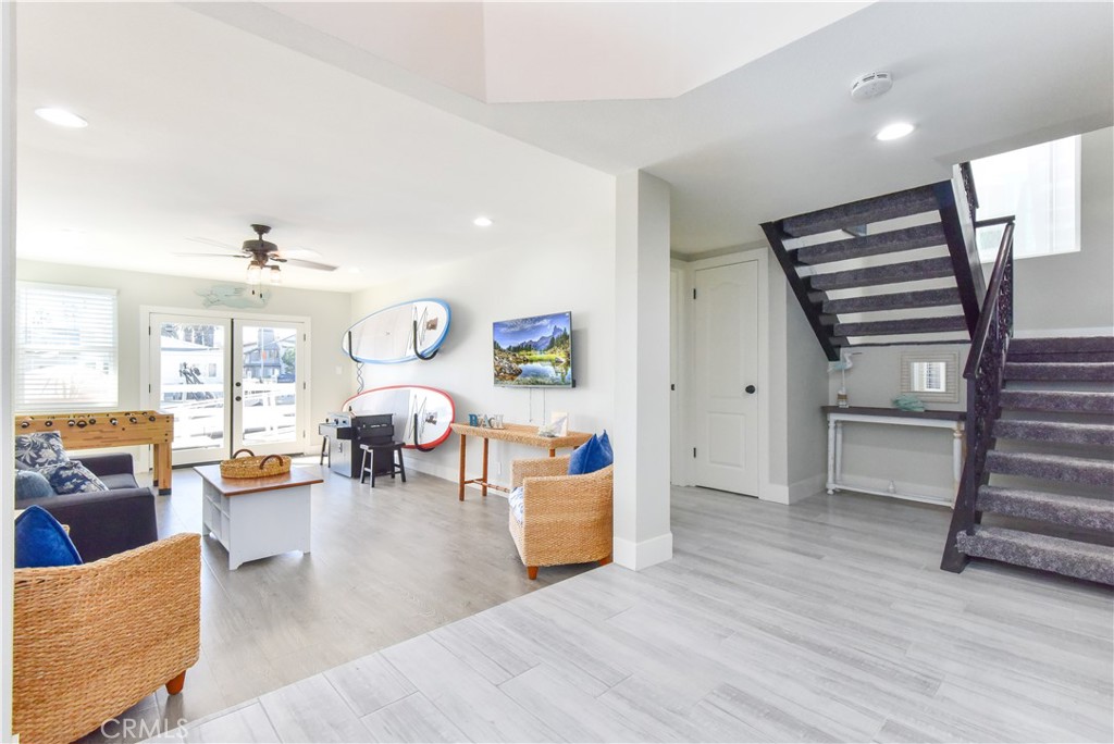 16791 Bayview Drive Huntington Beach, CA 90742 - Photo 18 of 75 a living room with furniture and wooden floor