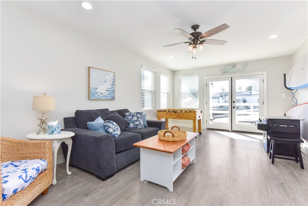 16791 Bayview Drive Huntington Beach, CA 90742 - Photo 21 of 75 a living room with furniture and a window