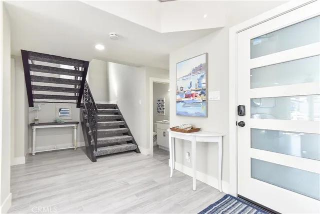 a bathroom with a toilet sink and shower
