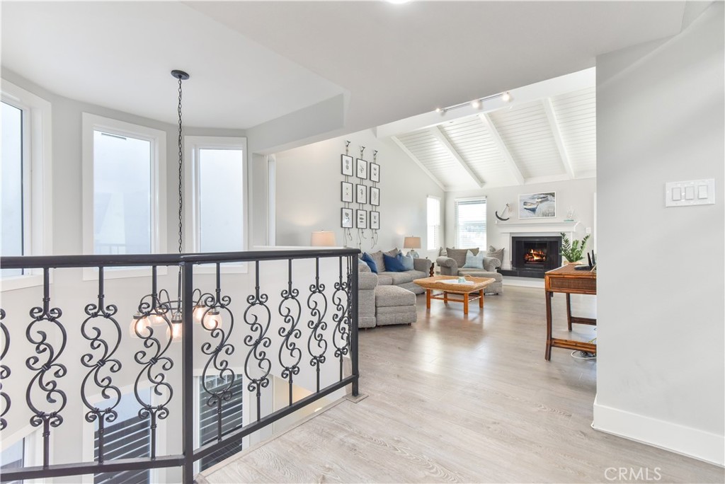 16791 Bayview Drive Huntington Beach, CA 90742 - Photo 36 of 75 a living room with furniture and a large window