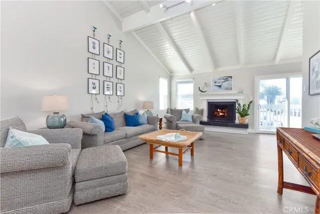 a bed sitting in a bedroom and painting on the wall