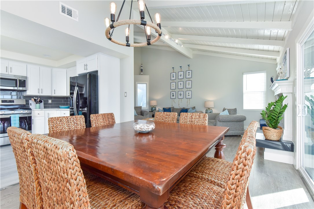 16791 Bayview Drive Huntington Beach, CA 90742 - Photo 44 of 75 a dining room with a table or chairs and a dining table