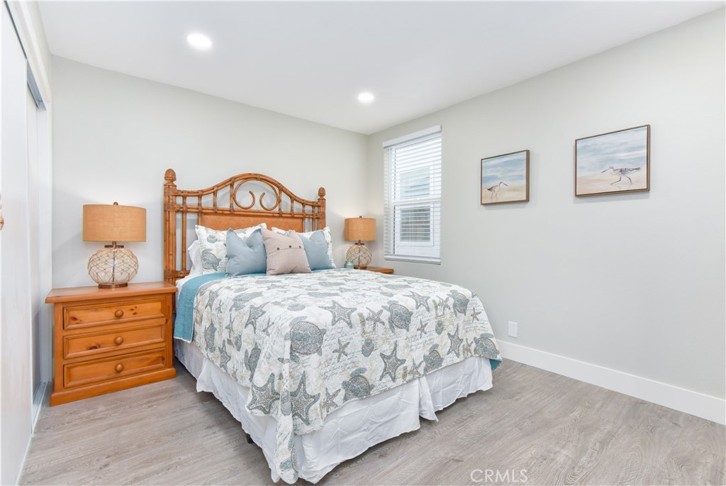 16791 Bayview Drive Huntington Beach, CA 90742 - Photo 48 of 75 a bedroom with a bed and a dresser