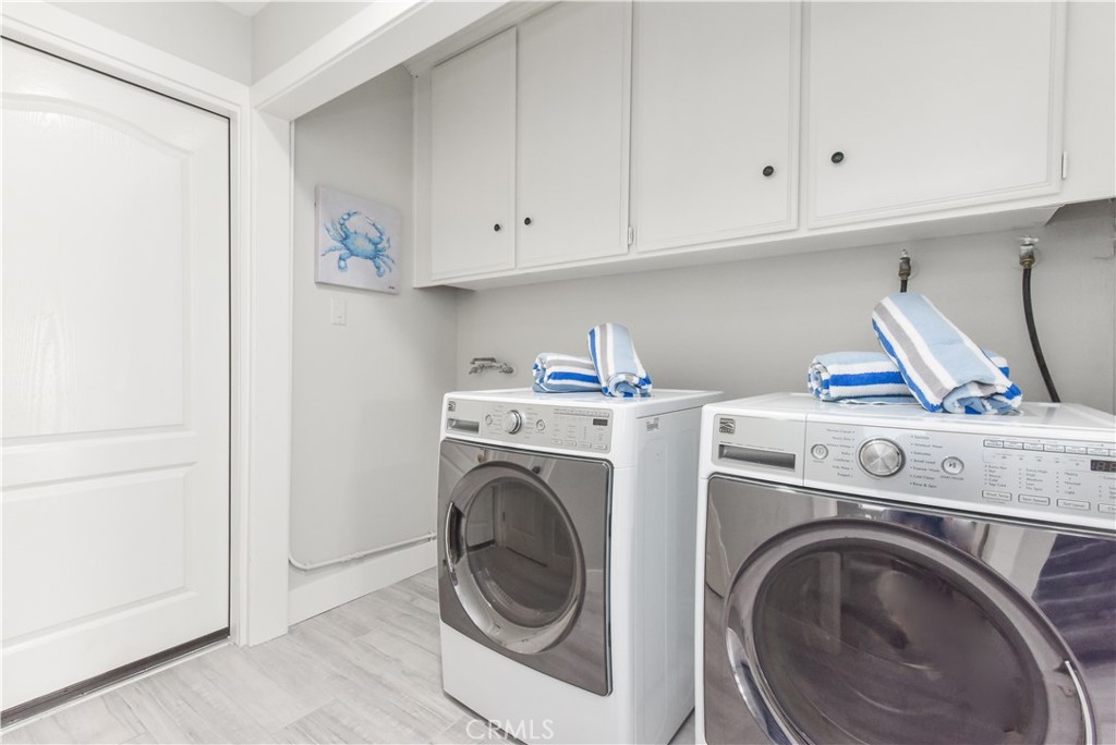 16791 Bayview Drive Huntington Beach, CA 90742 - Photo 70 of 75 a utility room with dryer and washer