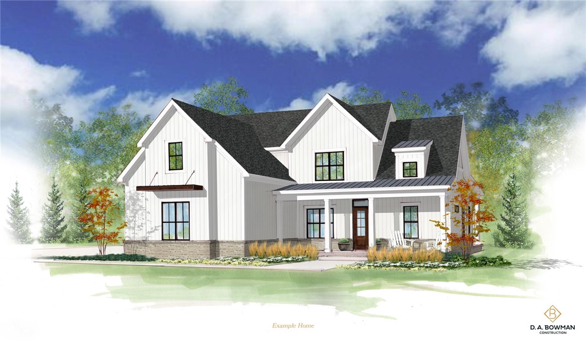 3093 Highway 36, Unit LOT 2 Piqua, OH 45356 - Photo 2 of 5 This charming residence features a classic facade and welcoming front porch.