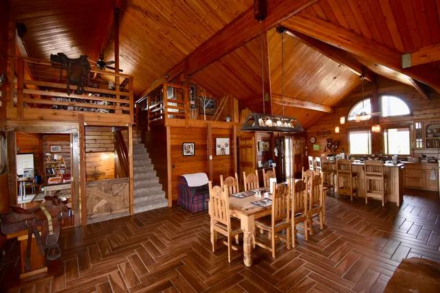a view of a chairs and tables in patio