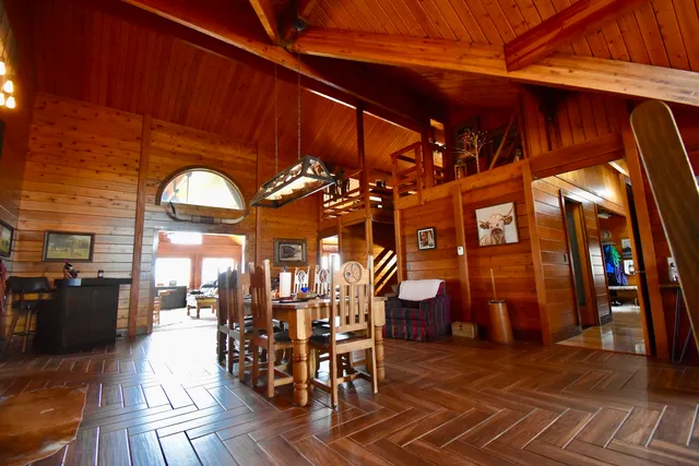 a view of a chairs and tables on the patio