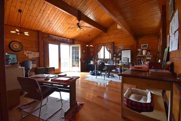 a view of a livingroom with furniture and window