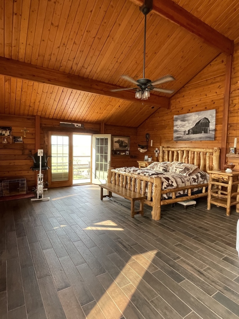 2951 North 28th Road Seneca, IL 61360 - Photo 26 of 53 a bedroom with furniture and a chandelier