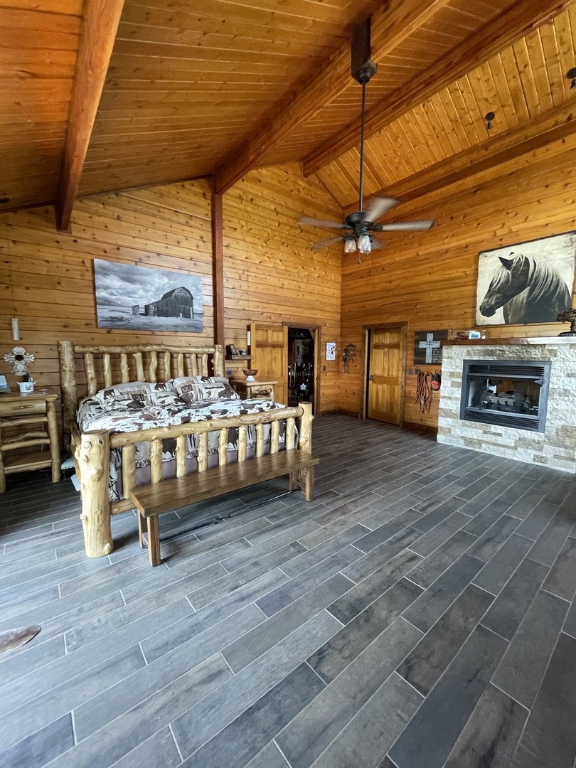 2951 North 28th Road Seneca, IL 61360 - Photo 27 of 53 a living room with furniture a flat screen tv and a fireplace