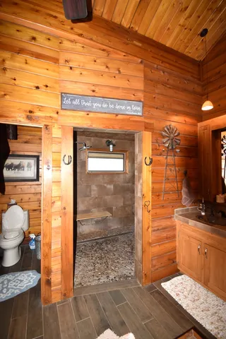 a view of a hallway with living room
