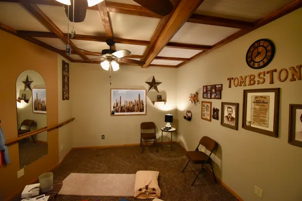 a room with furniture and a flat screen tv