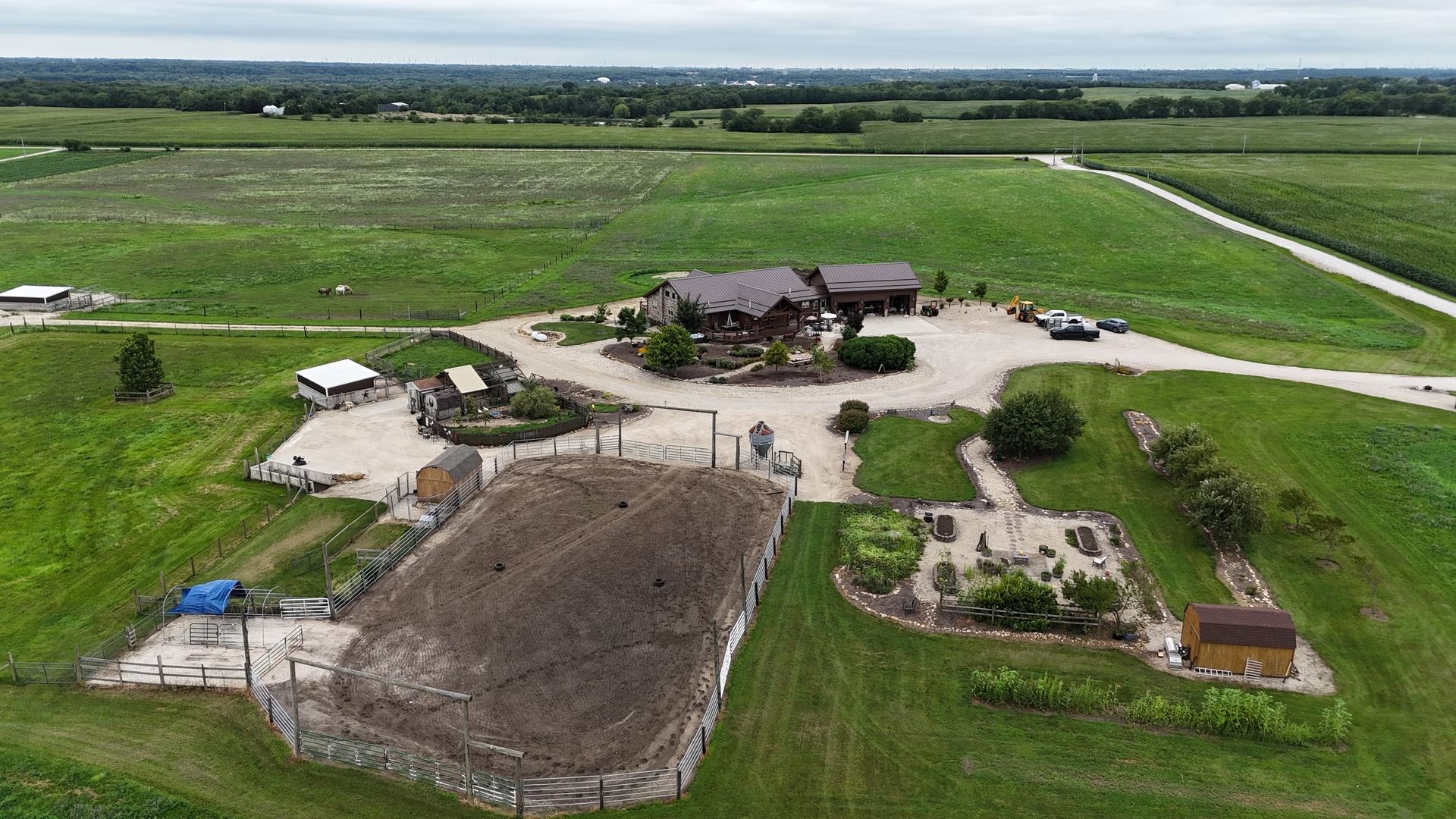 2951 North 28th Road Seneca, IL 61360 - Photo 48 of 53 an aerial view of a house with a garden and lake view
