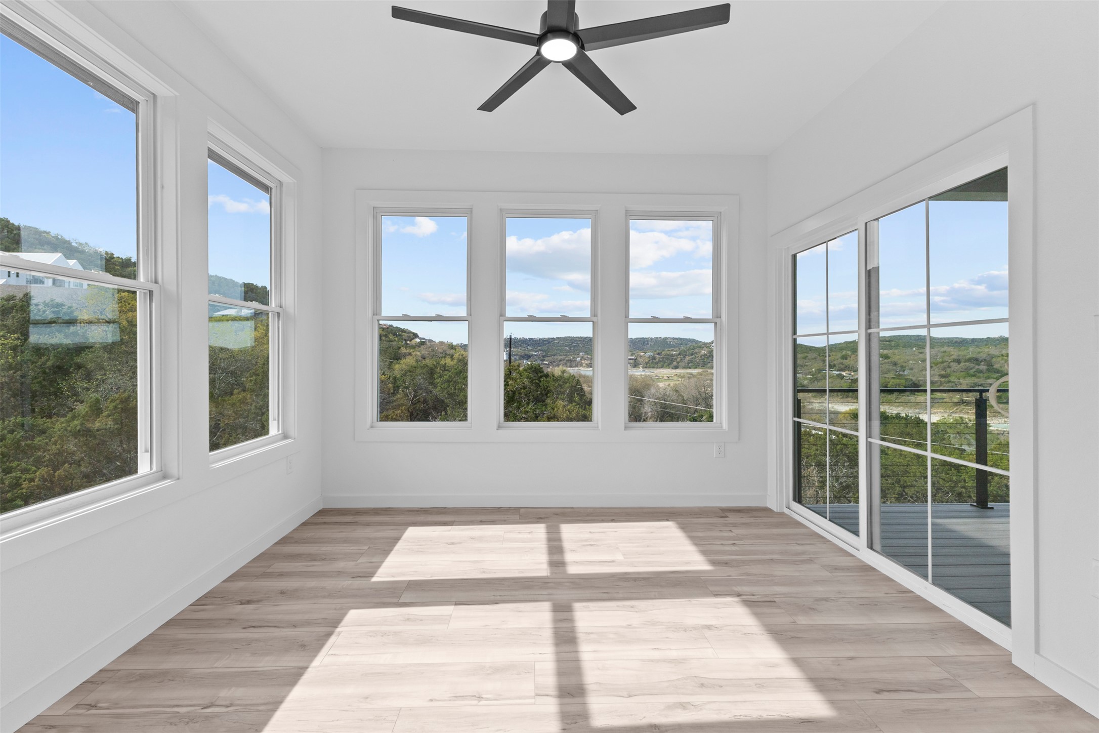 11005 Beach Road Leander, TX 78641 - Photo 28 of 40 Unfurnished office featuring wood finished floors and baseboards
