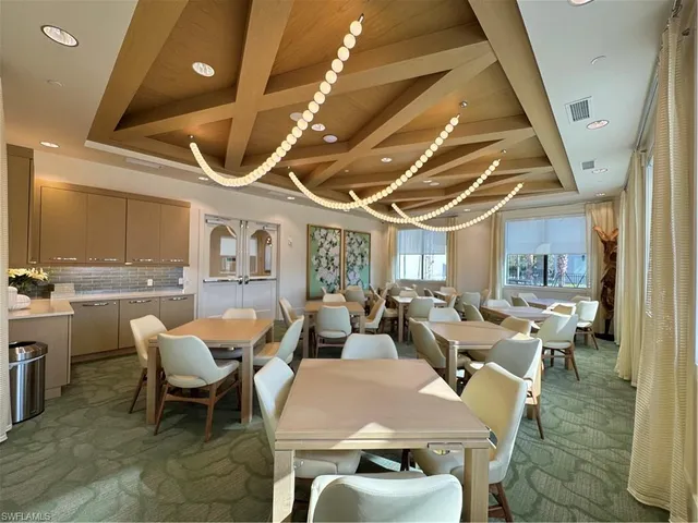 a view of a house with swimming pool and a yard