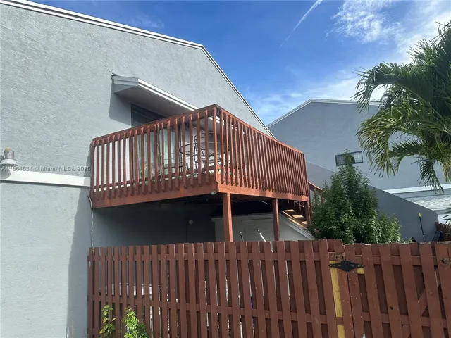 a view of a house with a deck