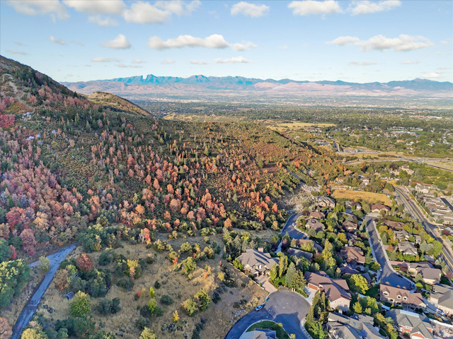 3738 Catamount Ridge Way, Unit 11 Sandy, UT 84092 - Photo 10 of 10 Expansive aerial showcasing a mountainous landscape with vibrant autumn foliage