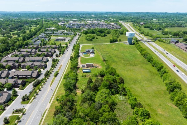 1224 Stop 30 Road Hendersonville, TN 37075 - Photo 7 of 11 an aerial view of residential houses with outdoor space and trees