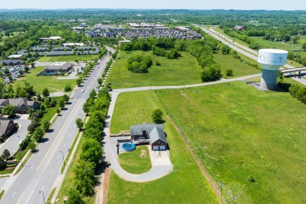1224 Stop 30 Road Hendersonville, TN 37075 - Photo 10 of 11 an aerial view of residential houses with outdoor space and swimming pool