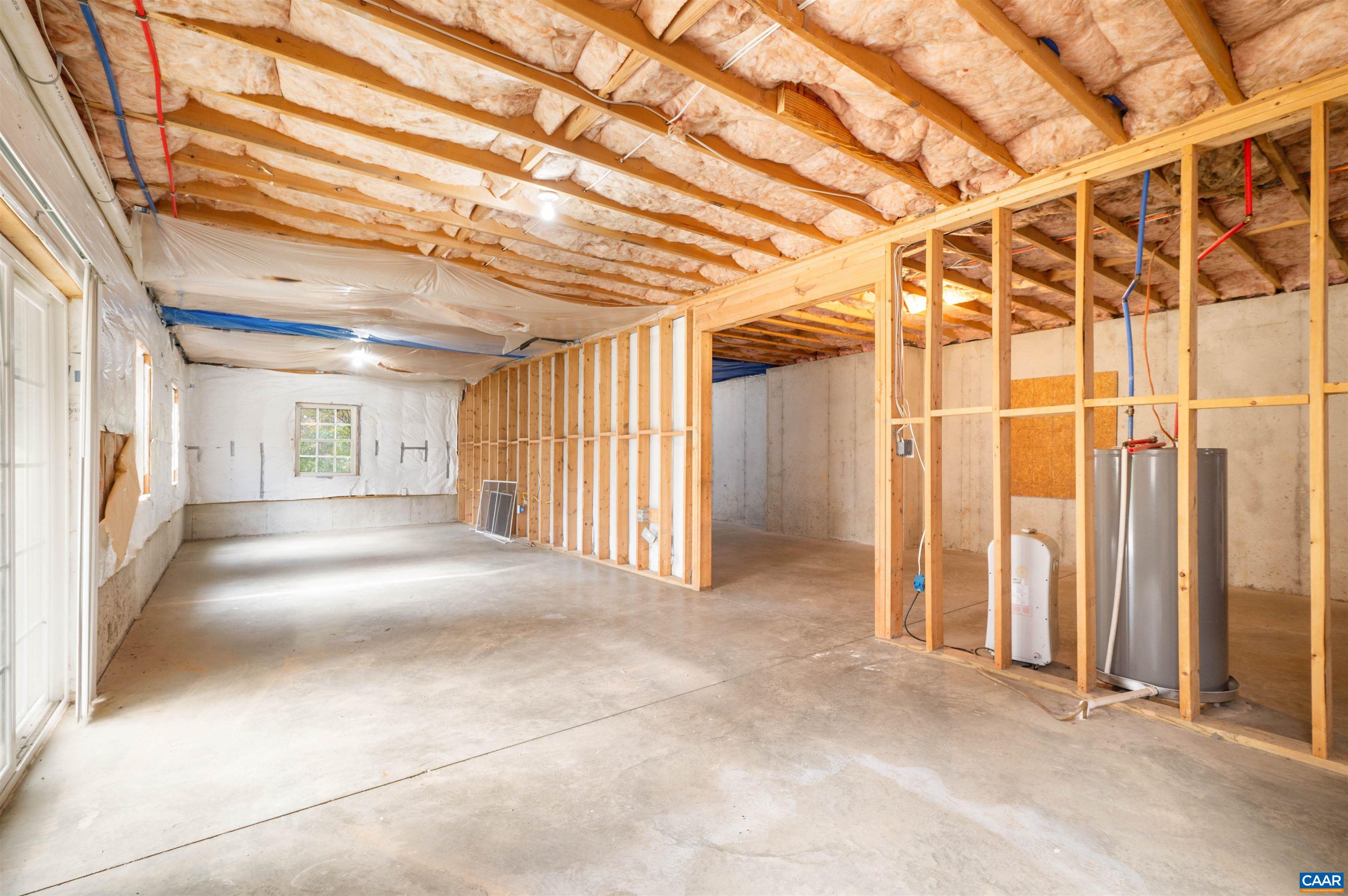 328 West Daffodil Road Ruckersville, VA 22968 - Photo 30 of 67 a view of a hallway with wooden walls