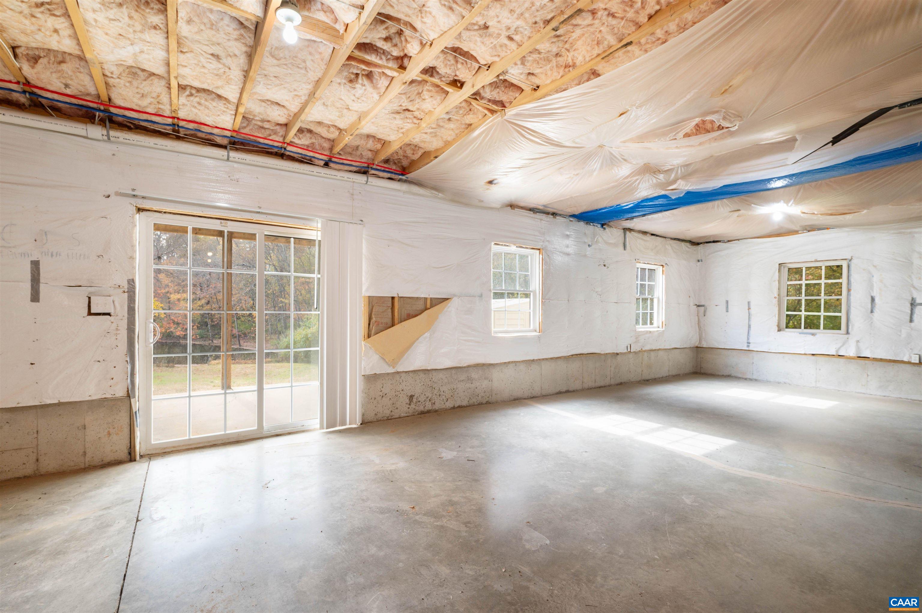 328 West Daffodil Road Ruckersville, VA 22968 - Photo 31 of 67 a view of a livingroom with a staircase