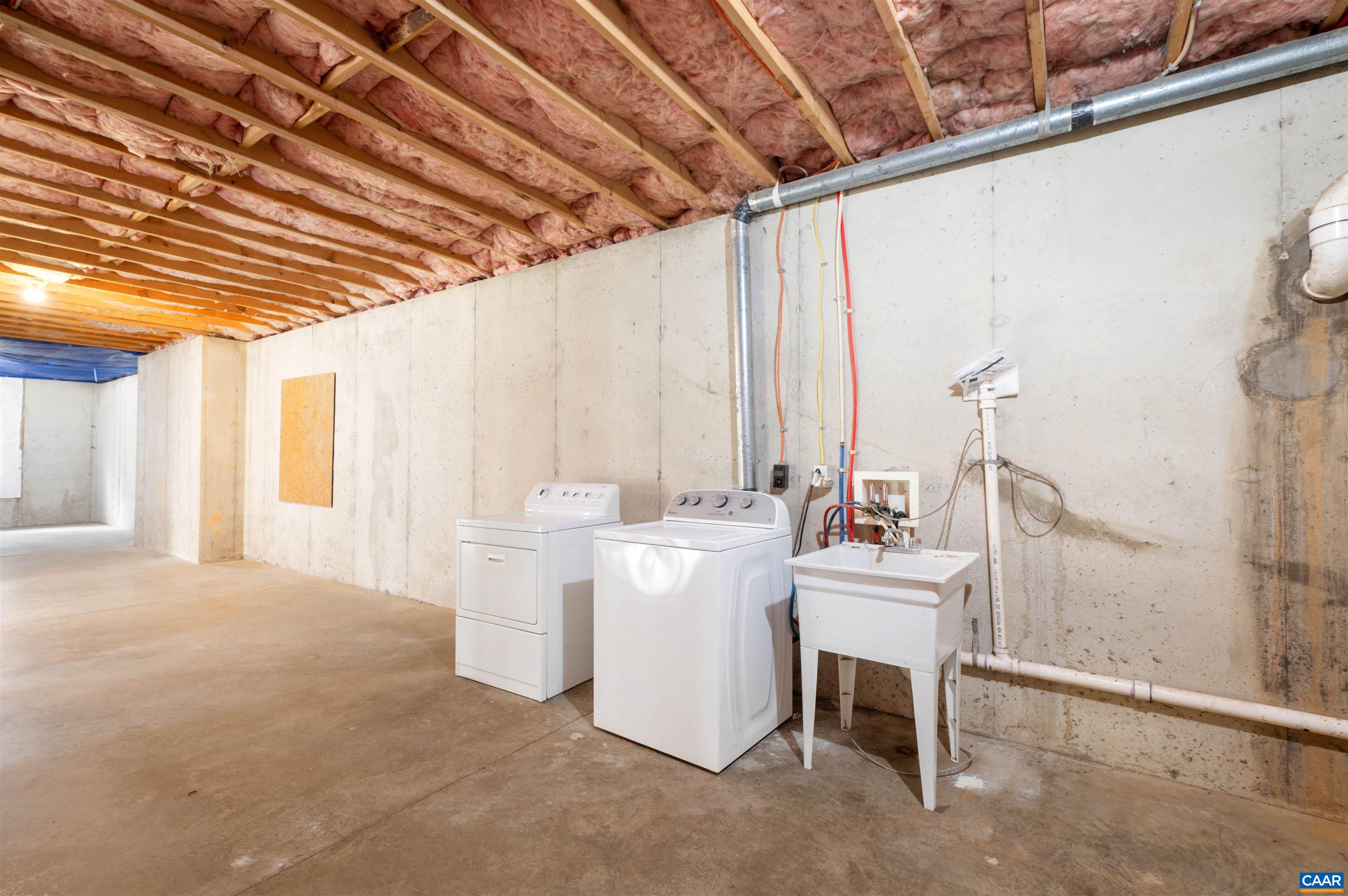 328 West Daffodil Road Ruckersville, VA 22968 - Photo 34 of 67 a room with a chair and white walls