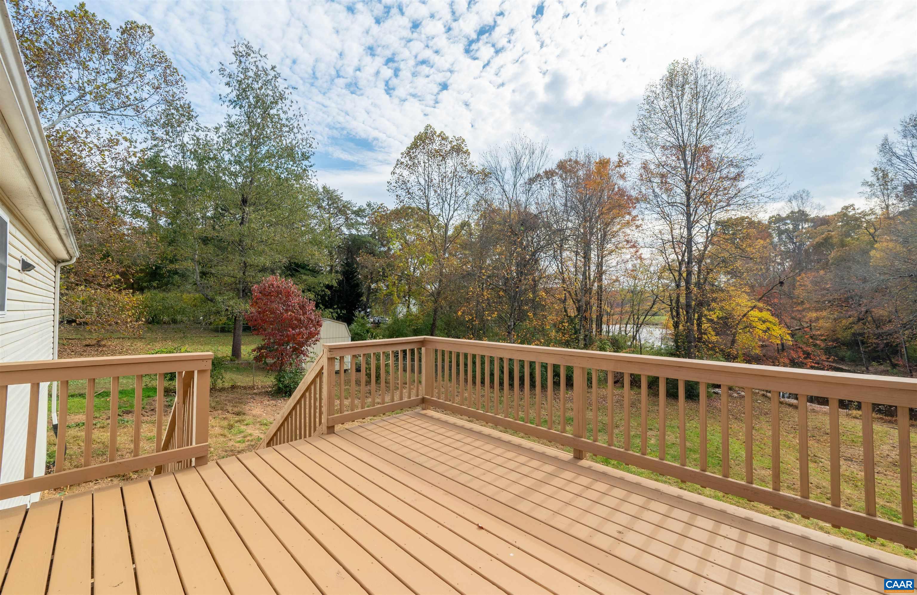 328 West Daffodil Road Ruckersville, VA 22968 - Photo 38 of 67 a view of balcony with wooden floor and fence