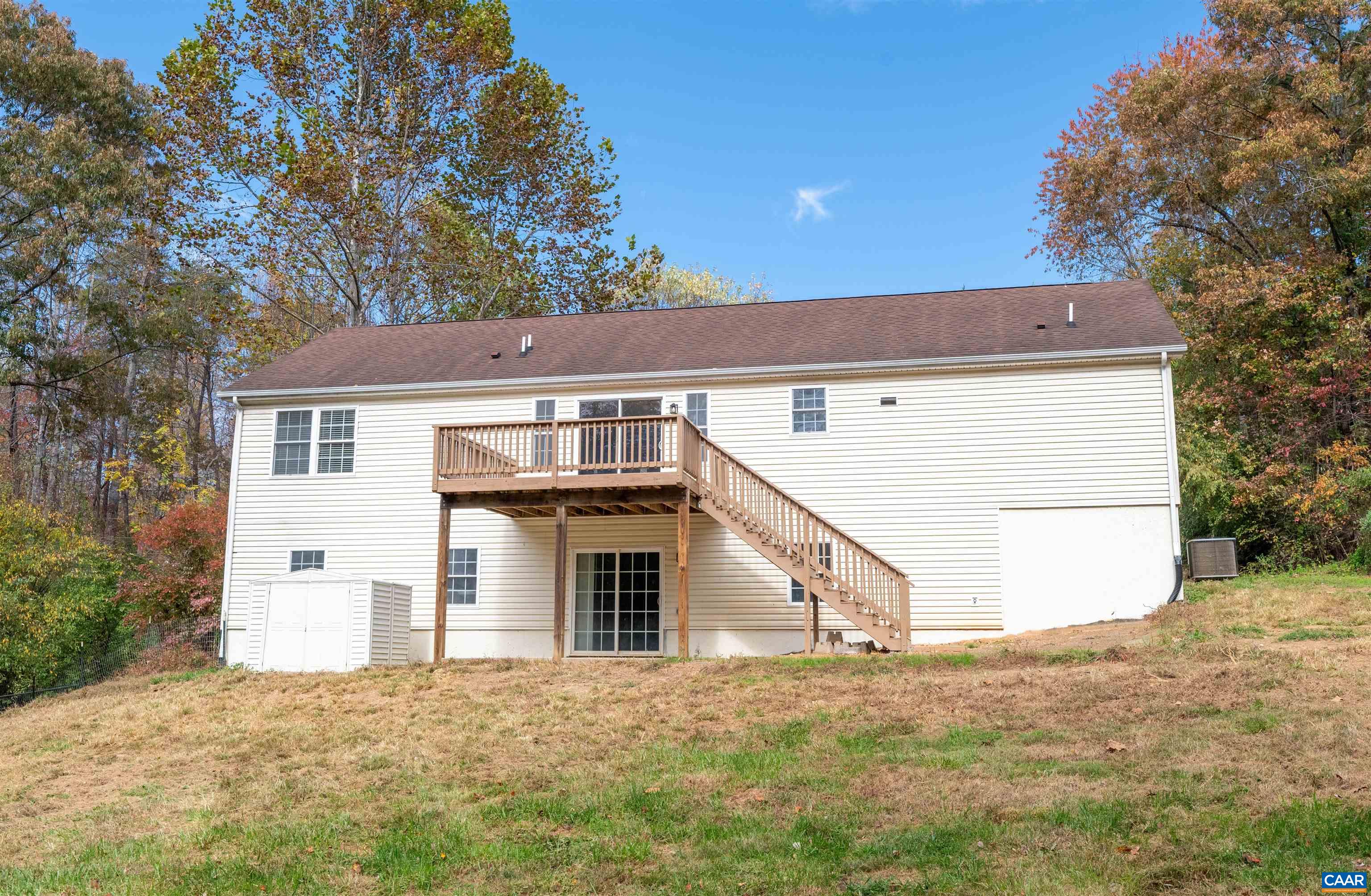 328 West Daffodil Road Ruckersville, VA 22968 - Photo 44 of 67 a view of a house with a yard