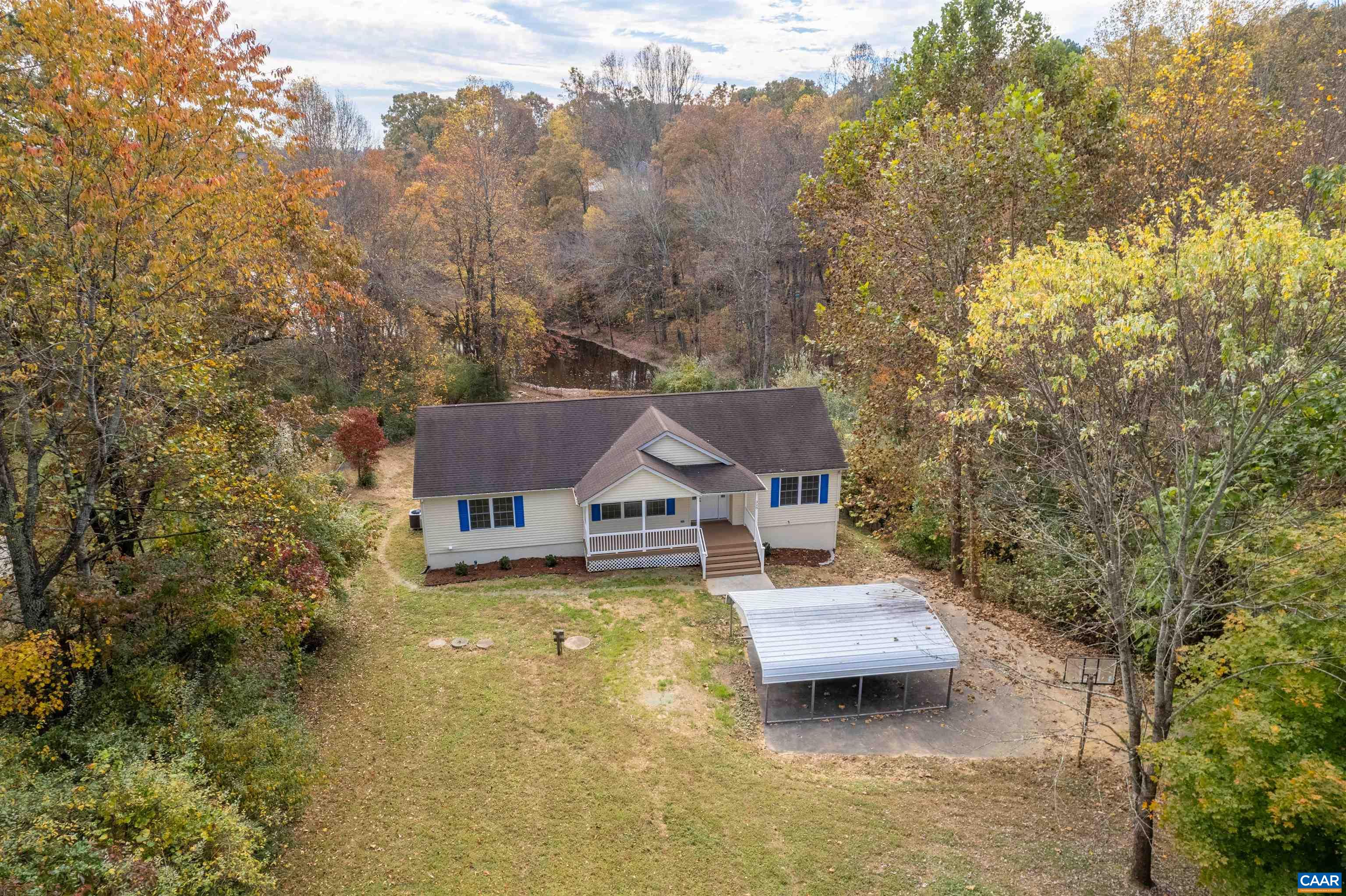 328 West Daffodil Road Ruckersville, VA 22968 - Photo 52 of 67 a house view with a garden space