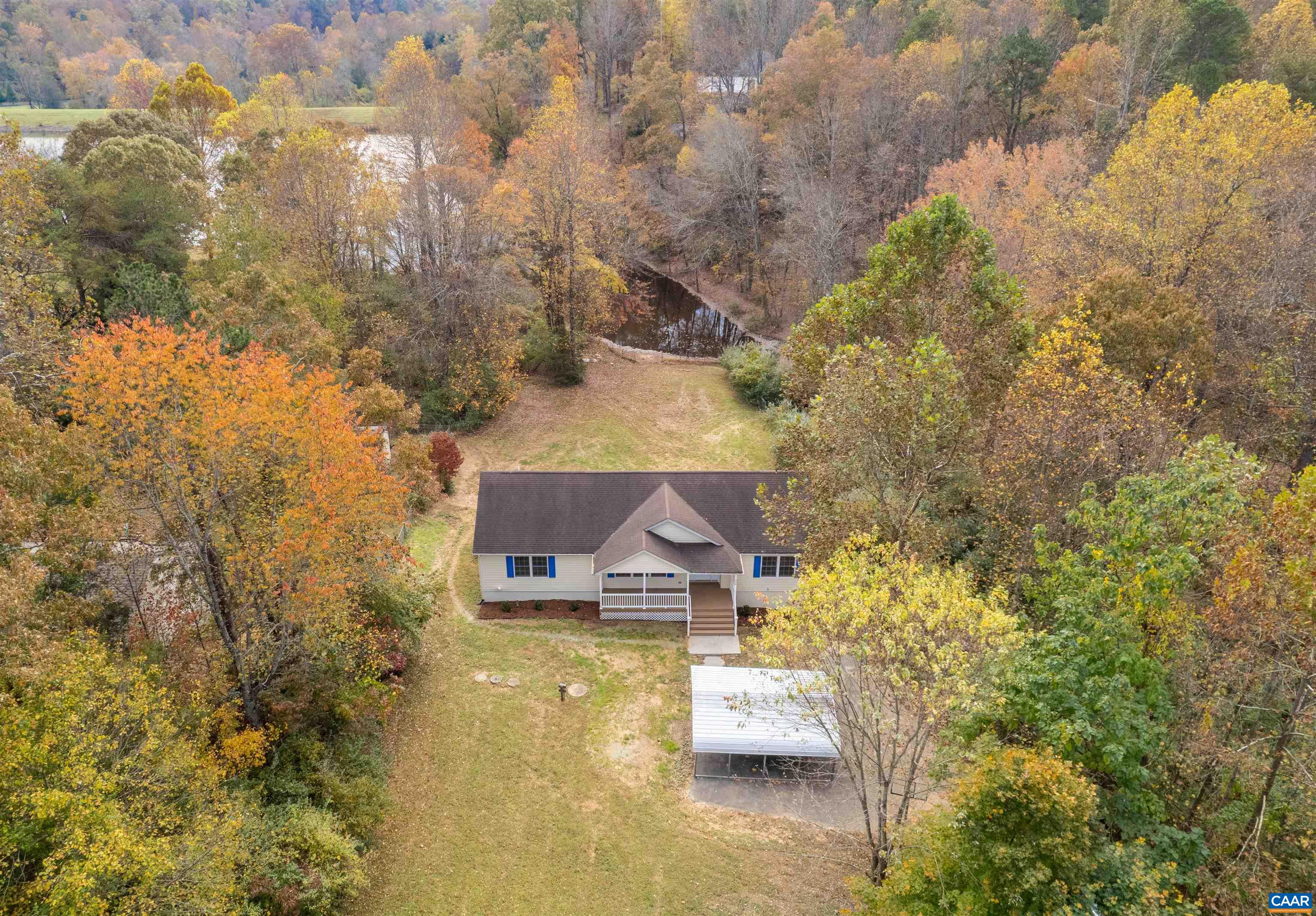 328 West Daffodil Road Ruckersville, VA 22968 - Photo 54 of 67 a view of a house with a yard