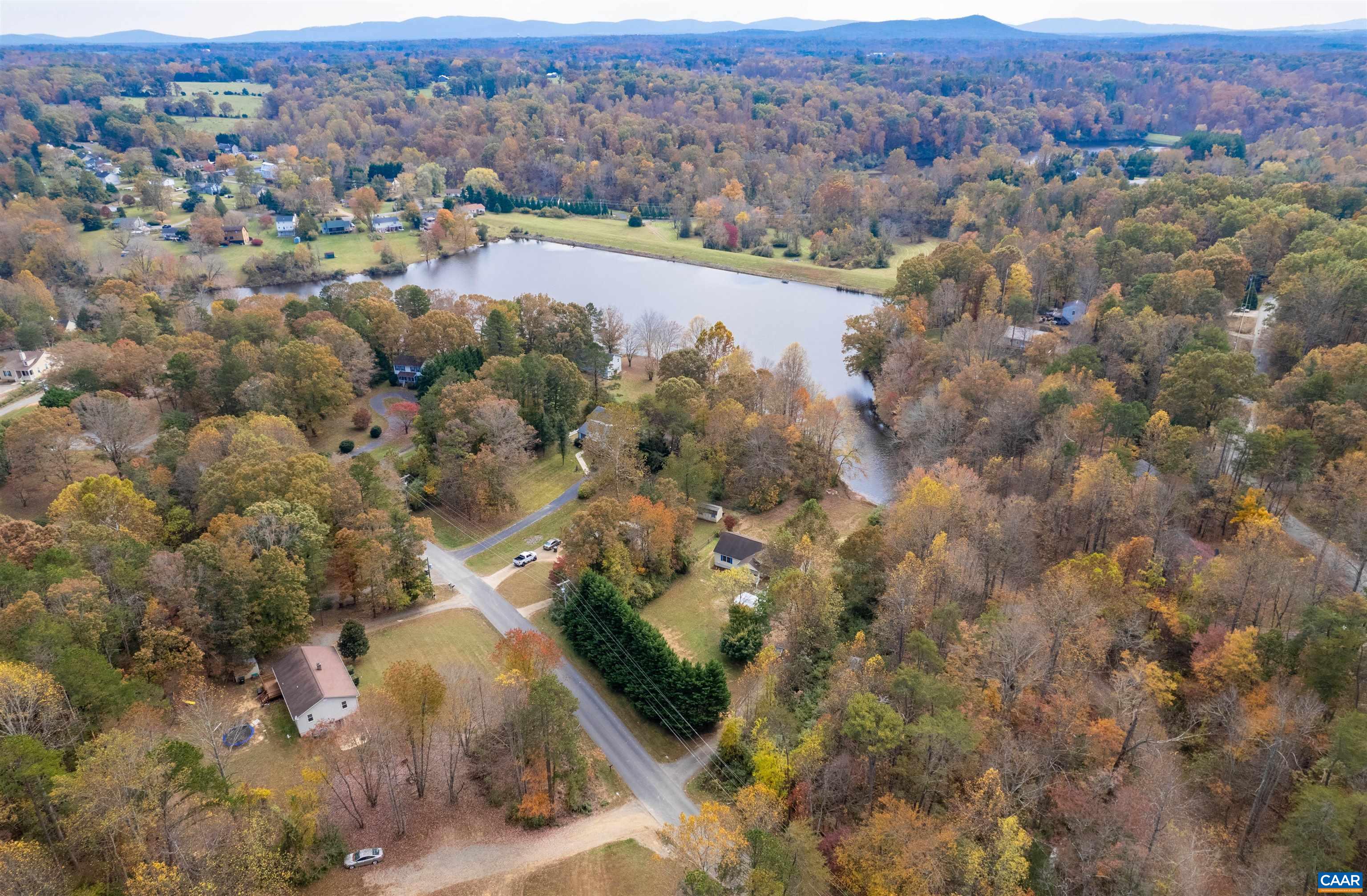 328 West Daffodil Road Ruckersville, VA 22968 - Photo 58 of 67 an aerial view of town with residential houses with outdoor space and trees